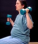 128px-Pregnant_Woman_With_Dumbells